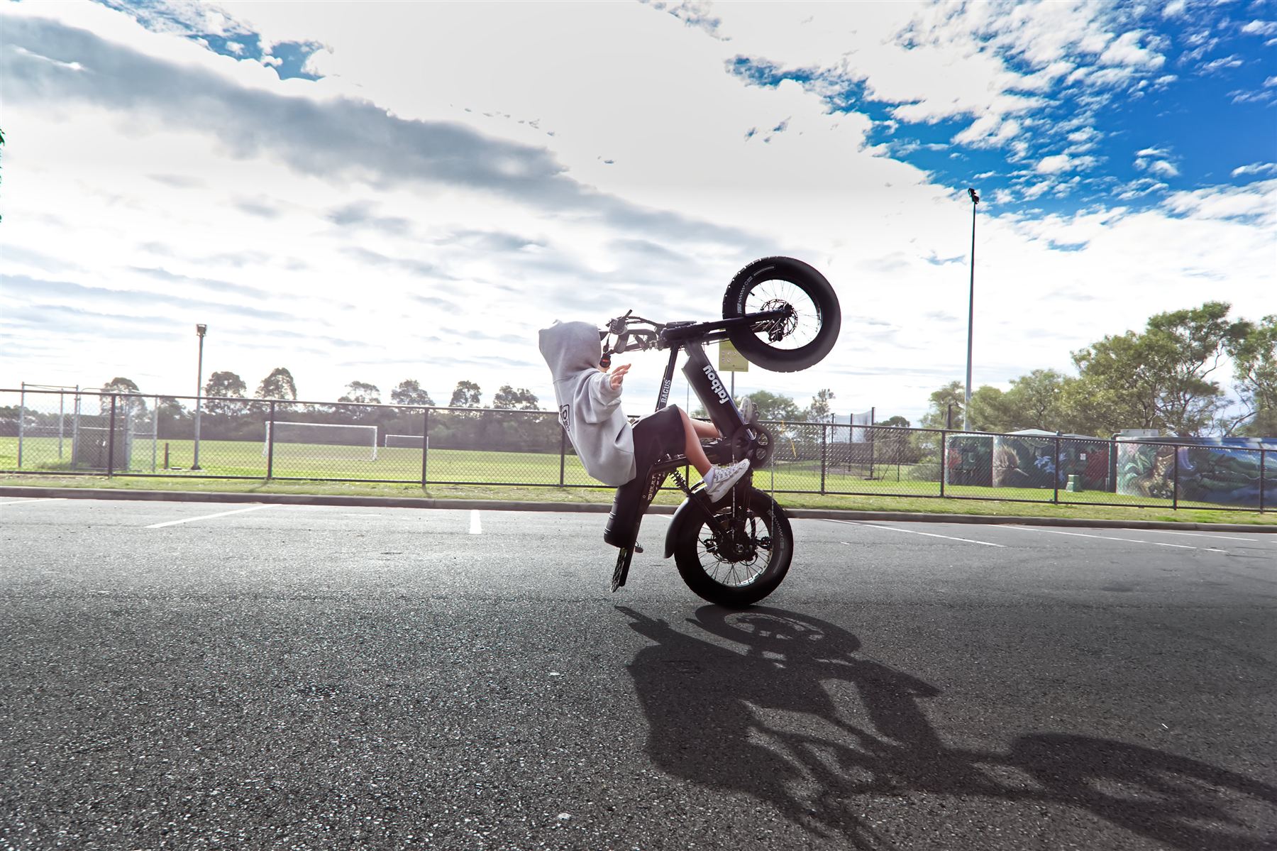 High chair wheelie under a big sky